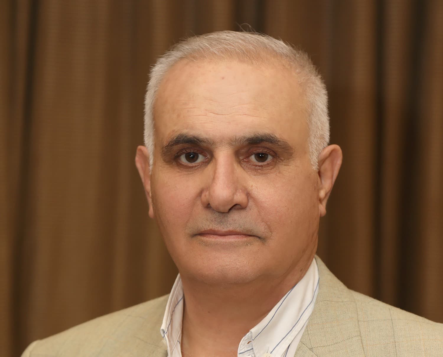 Dr. Marzouq Khair